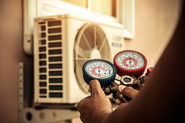 Professional Ductwork Repair technician working in Foxboro, MA